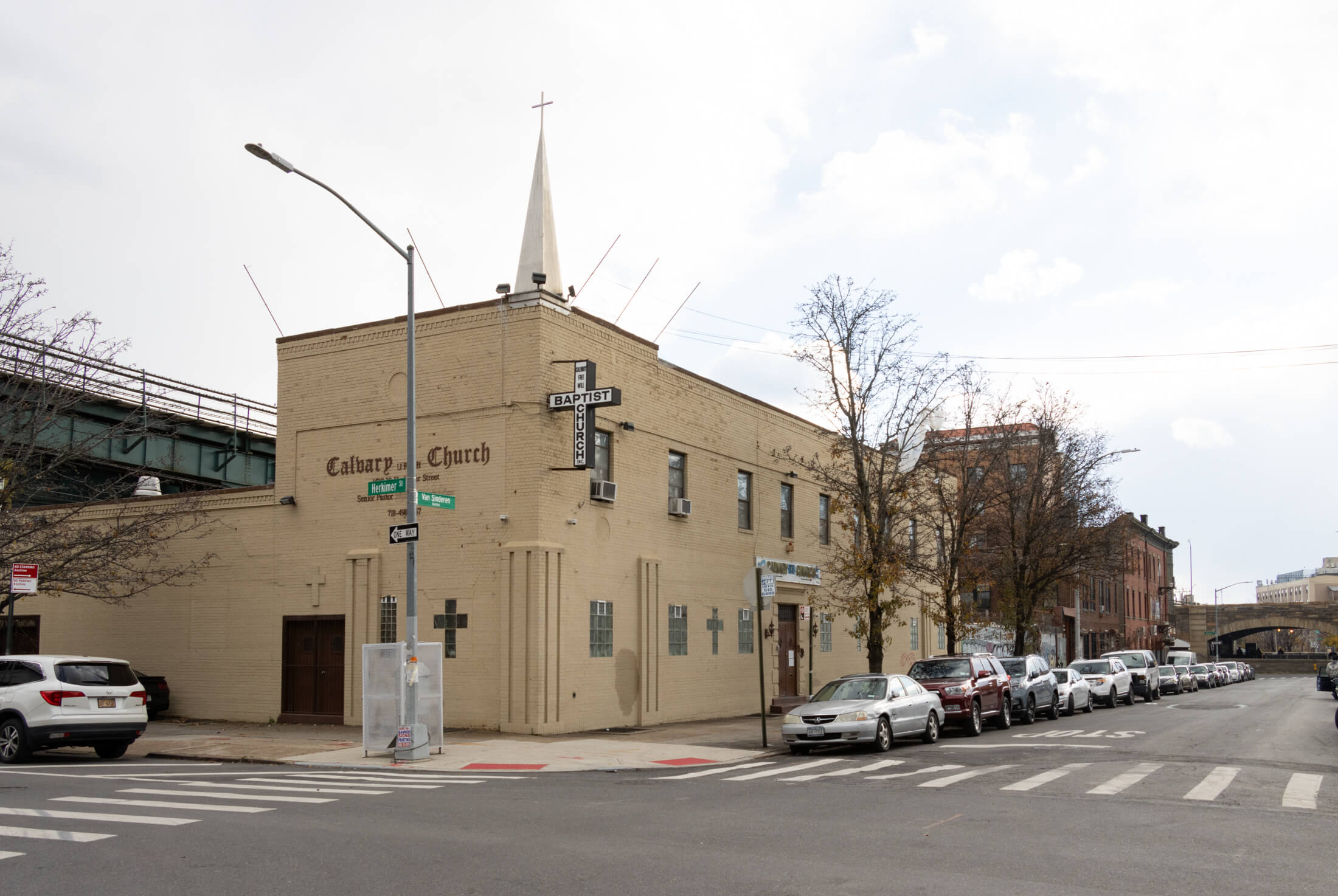 yellow painted brick church