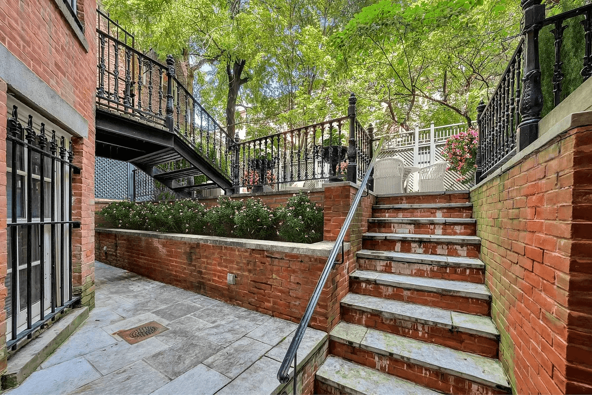 brick stairs from garden level yard to upprer patio