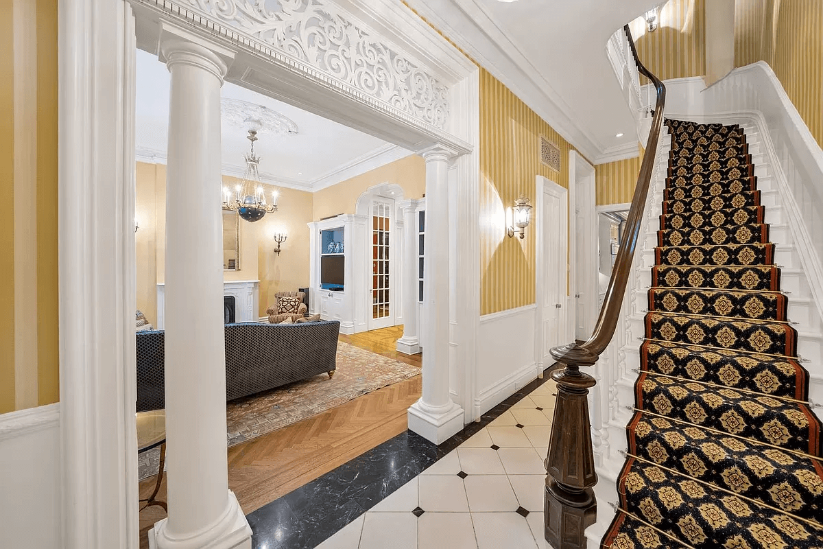 entry with yellow striped wallpaper
