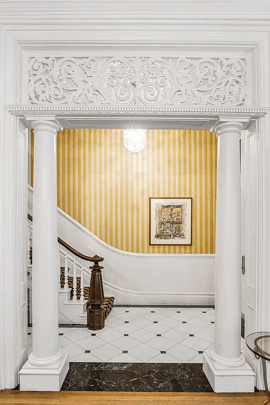 fretwork and columned doorway from parlor to entry