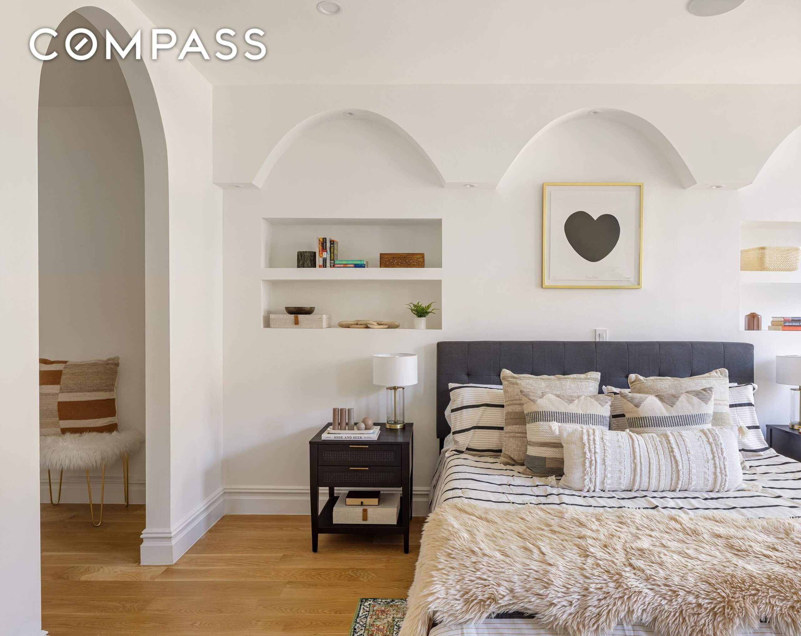 bedroom with niches and arches