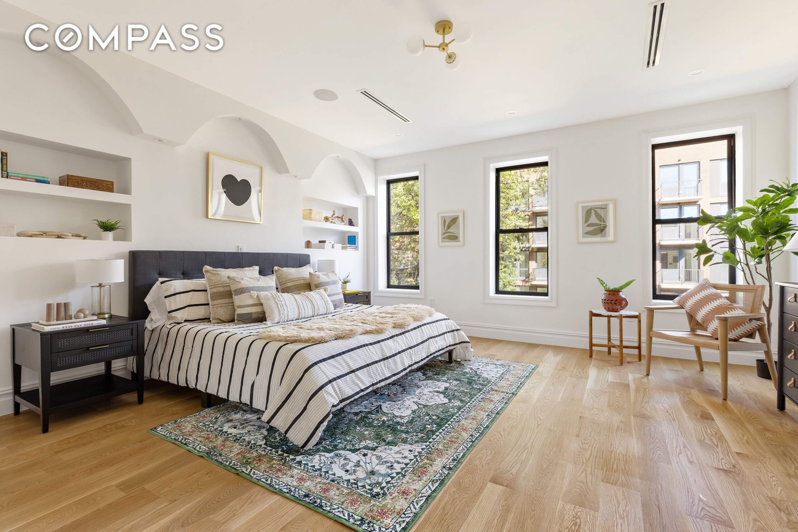 bedroom with white walls and arches