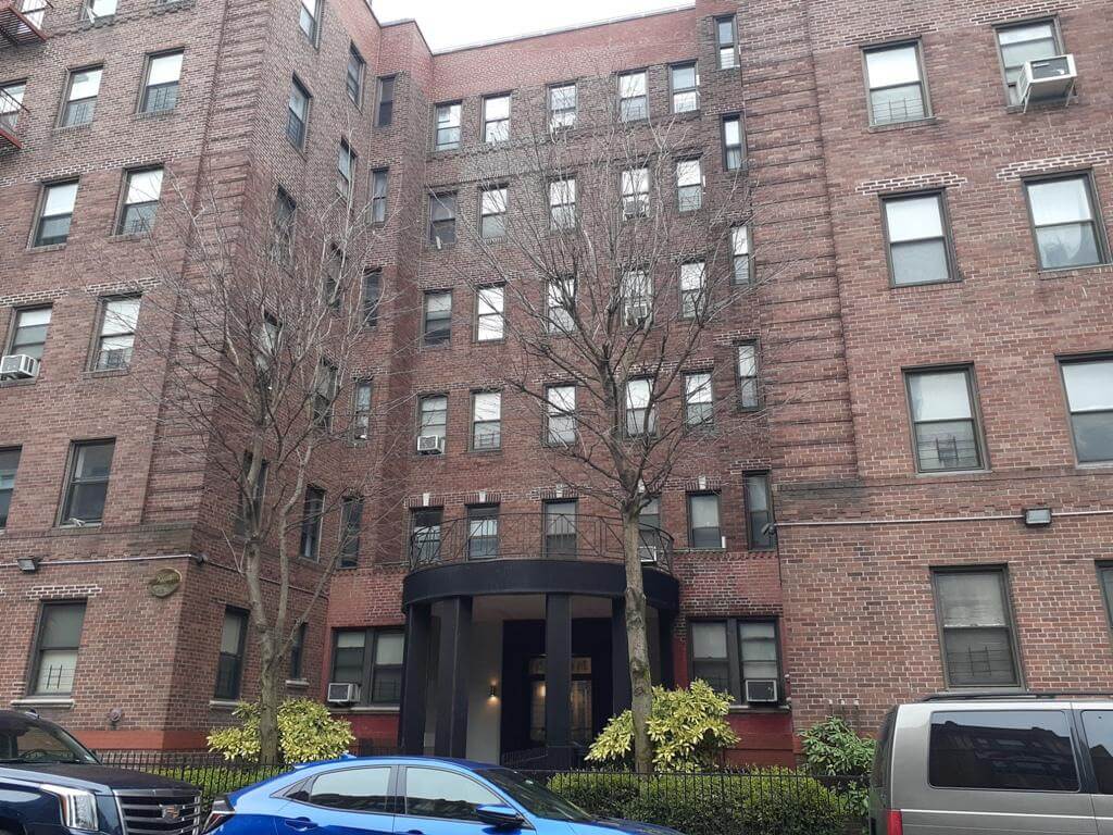 exterior of the brick apartment building