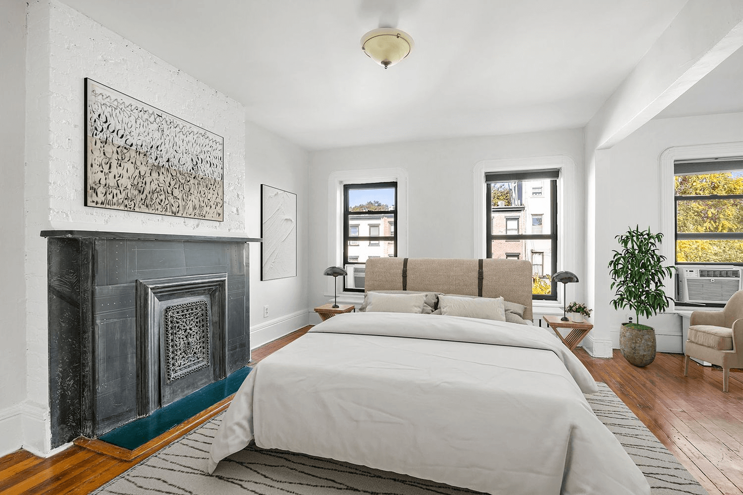 virtually staged bedroom with slate mantel