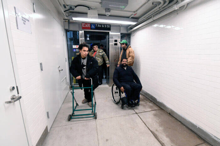 people exiting an elevator