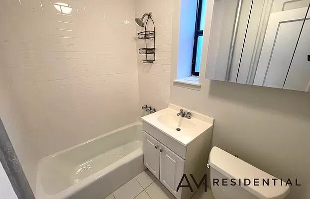 bathroom with white fixtures