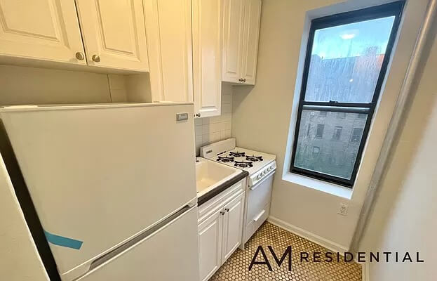 kitchen with white cabinets