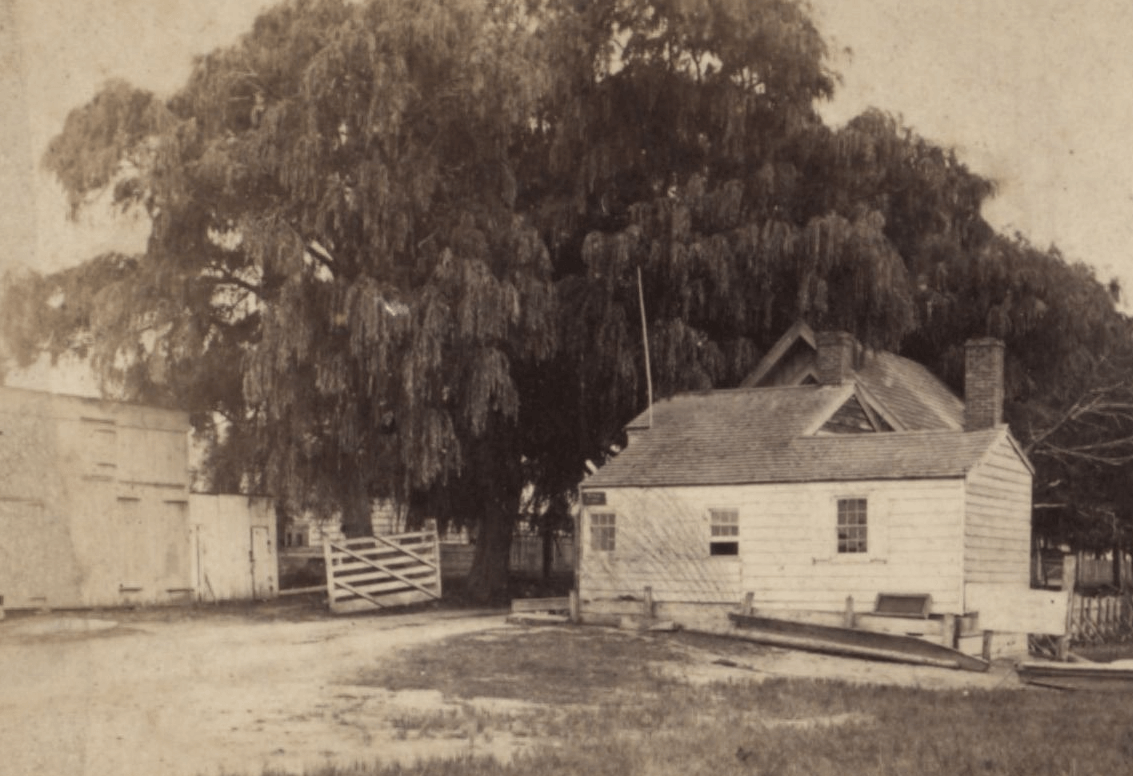 toll house - black and white photo of the small wooden toll house