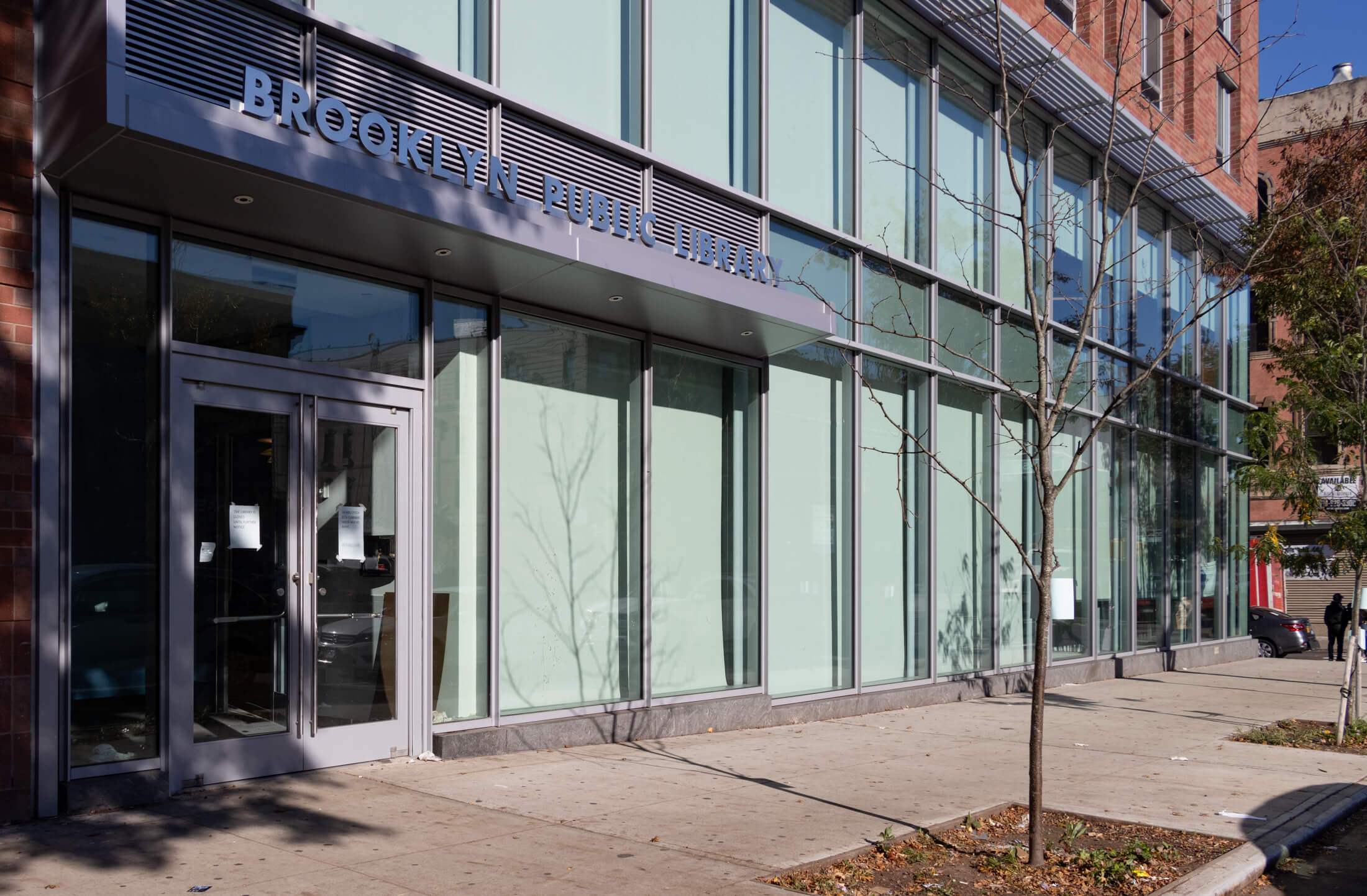 the brooklyn public library sign above the front door