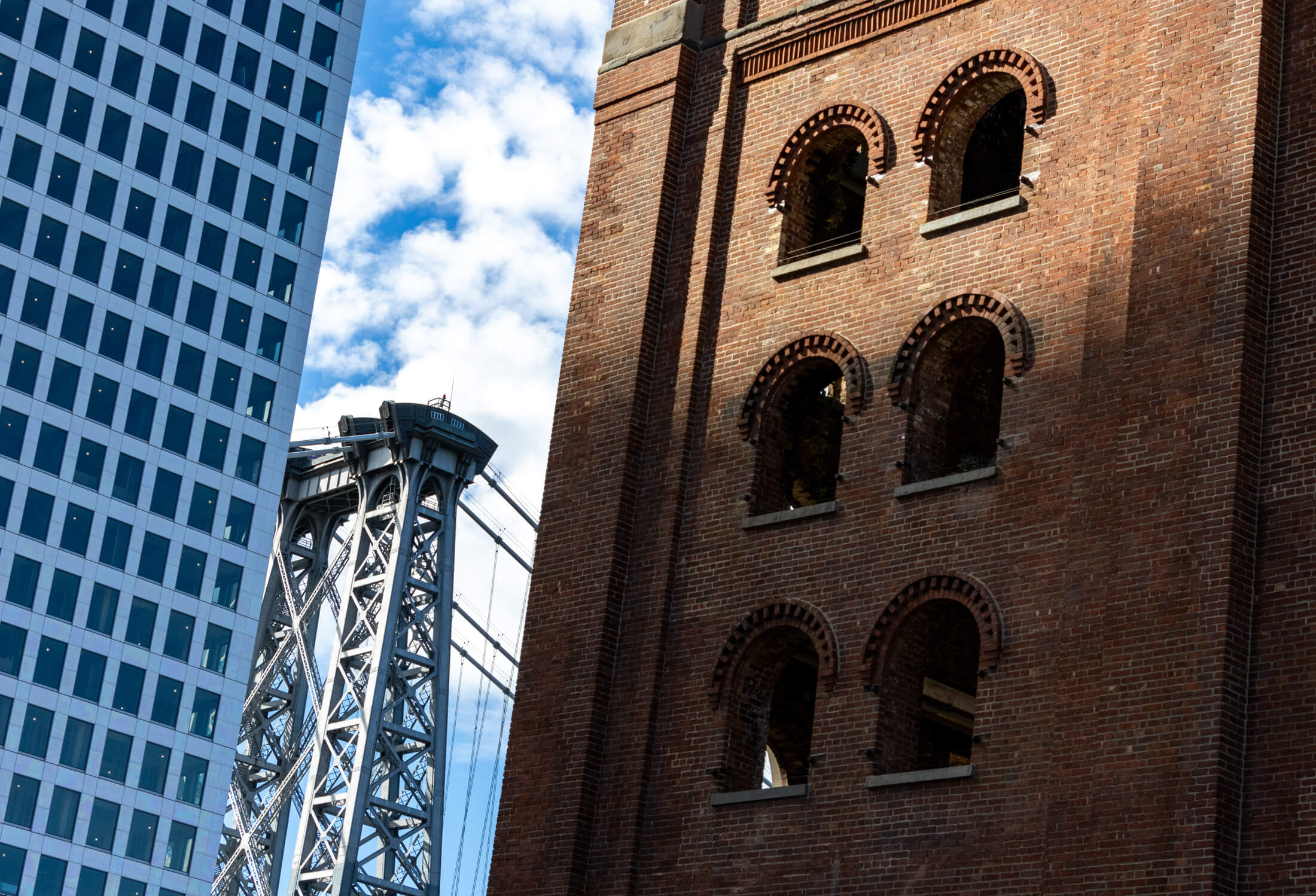 brooklyn - the williamsburg bridge and the domino sugar refinery