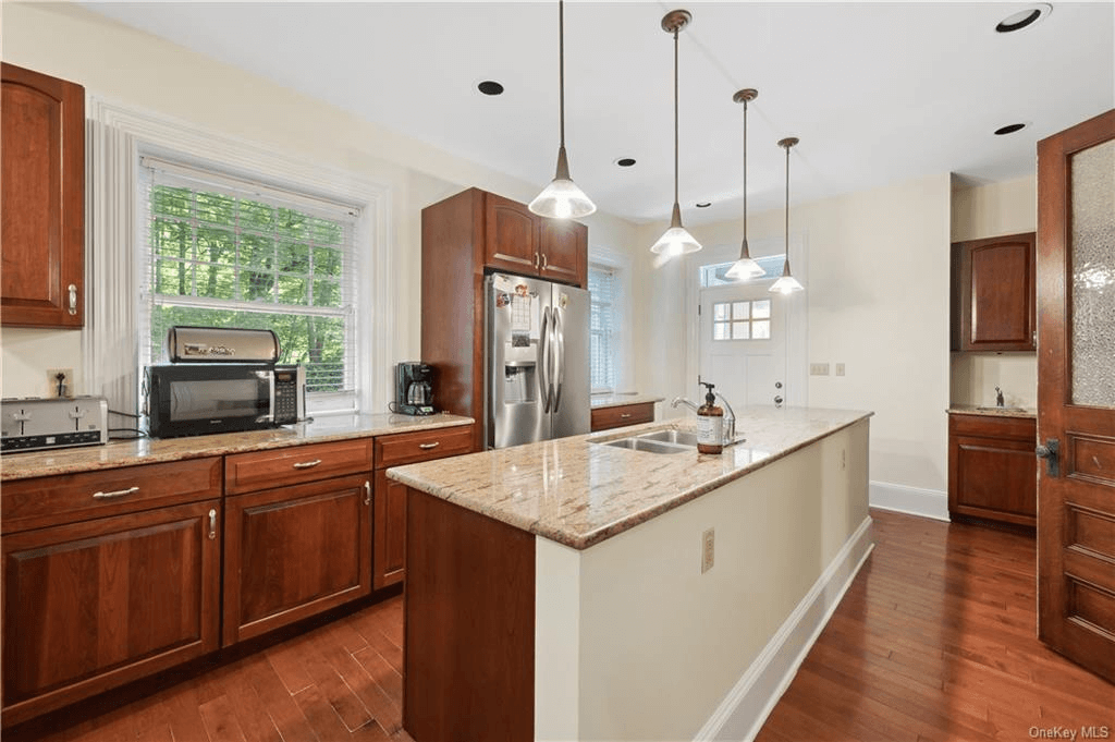 kitchen with wood cabinets and an island