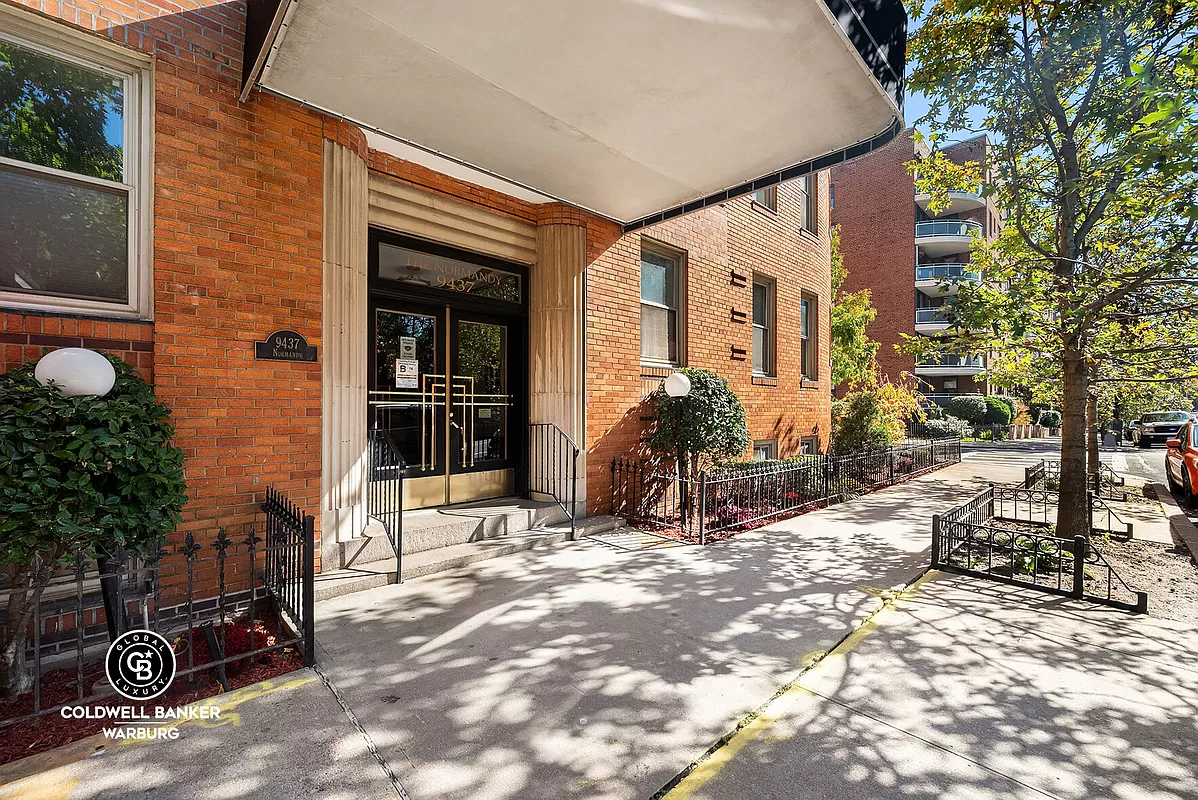 entry to building with awning and two steps to door