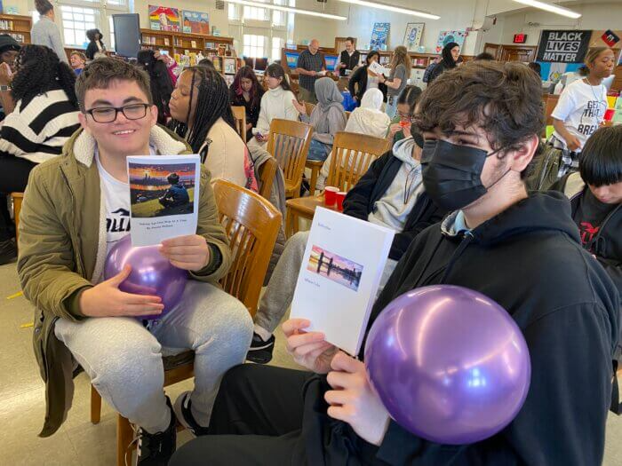 brooklyn students holding their publications