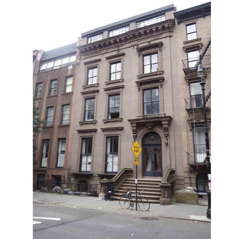 brownstone exterior with a stoop