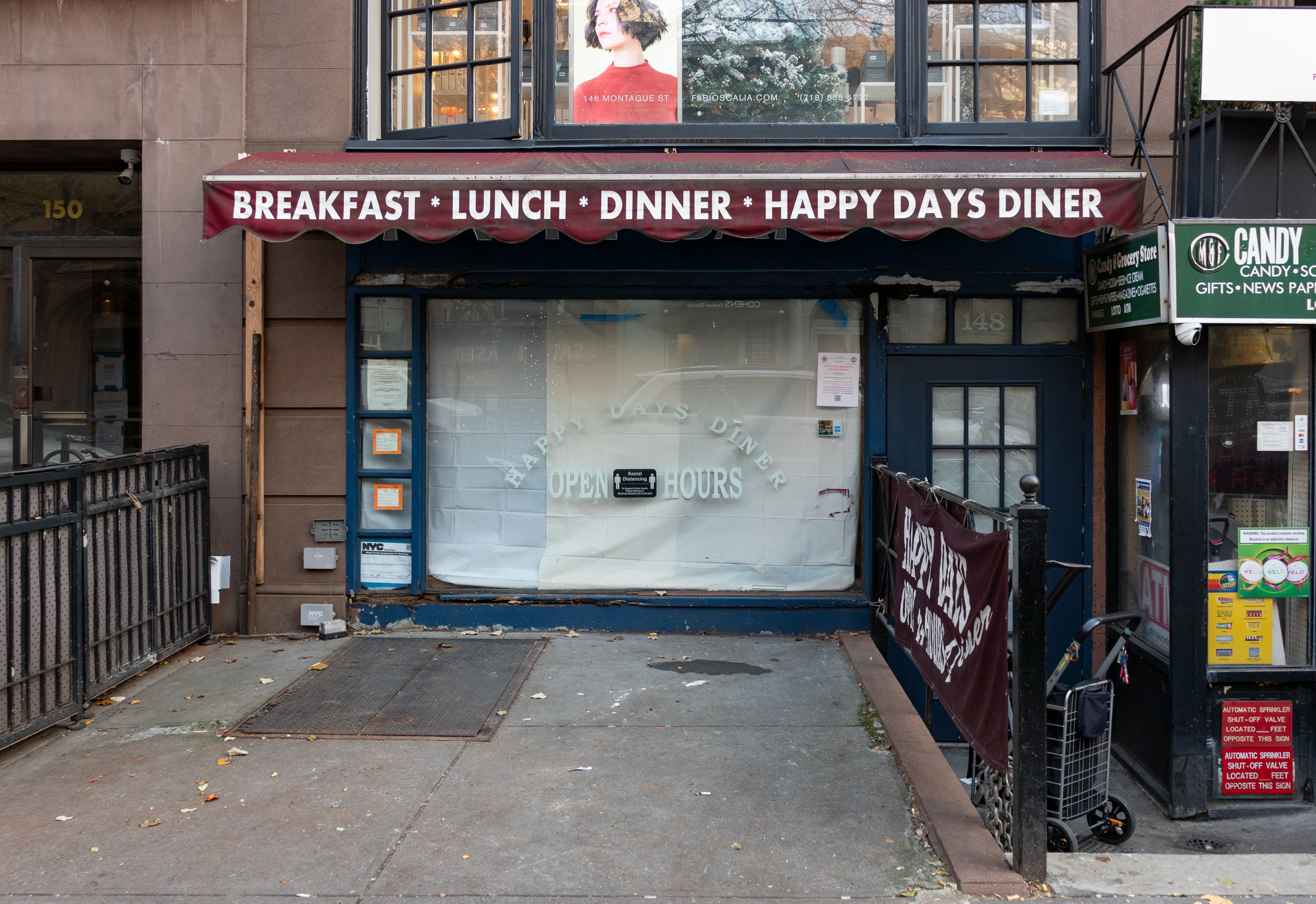 happy days diner exterior - papered over restaurant with awning for happy days diner