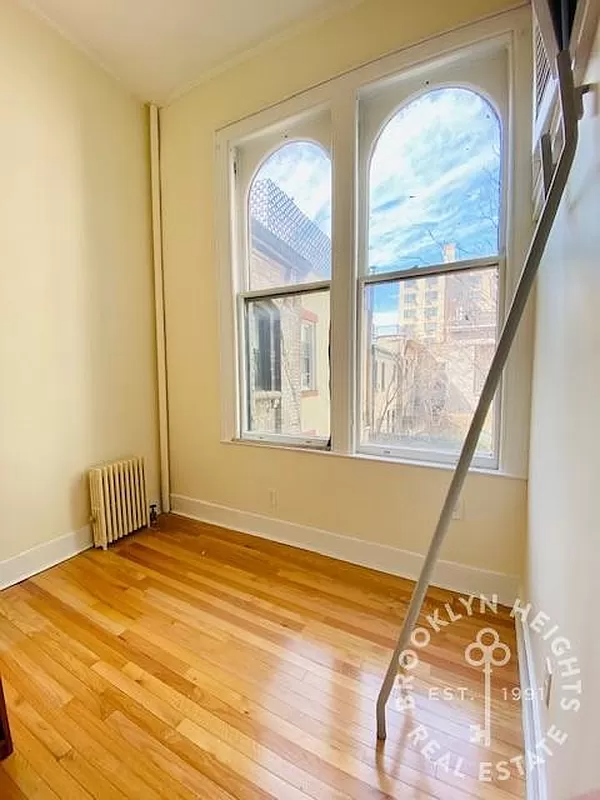 bedroom with two windows