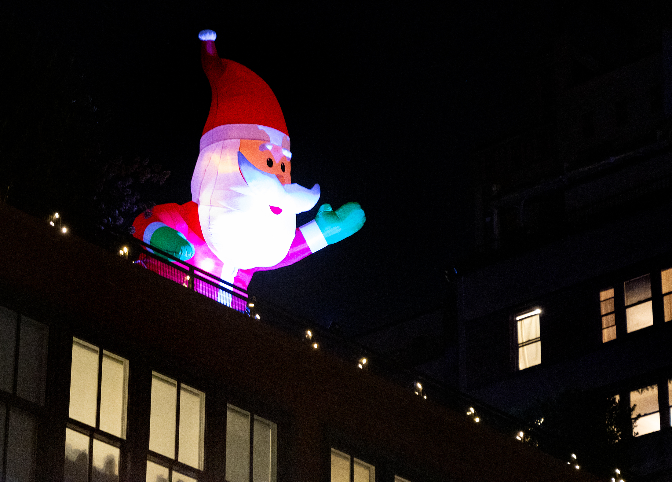 brooklyn: inflated santa on top of a brooklyn heights roof