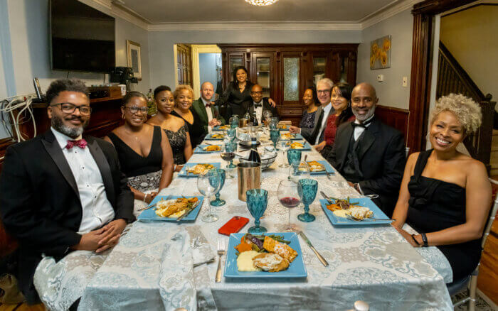 people seated at a table for a meal