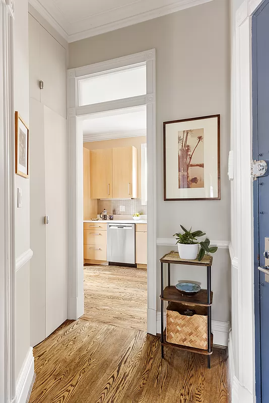 hall with view into kitchen