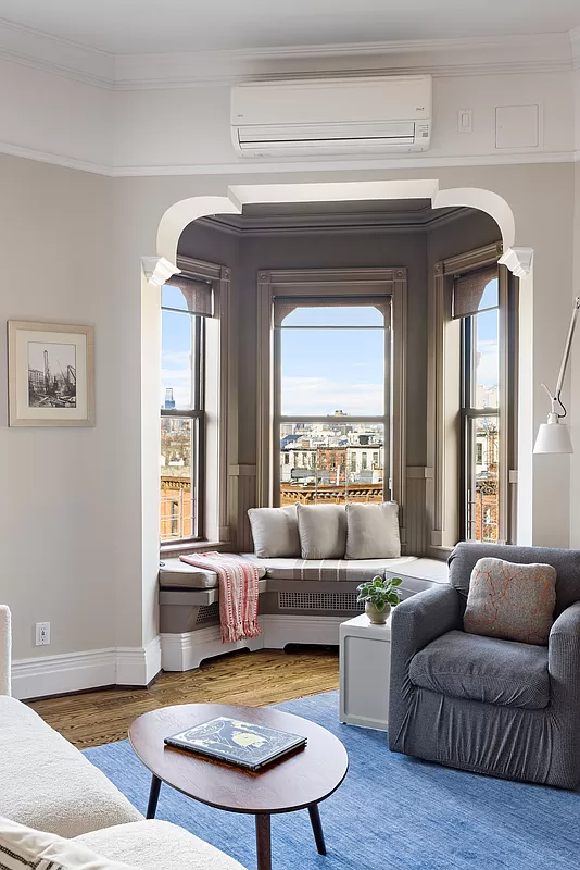 window seat set into a niche in the living room