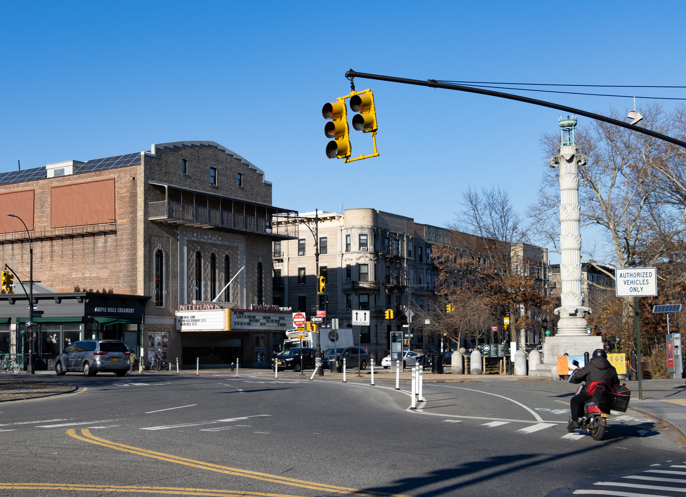 brooklyn - traffic at bartel-pritchard square with nitehawk theater in the background