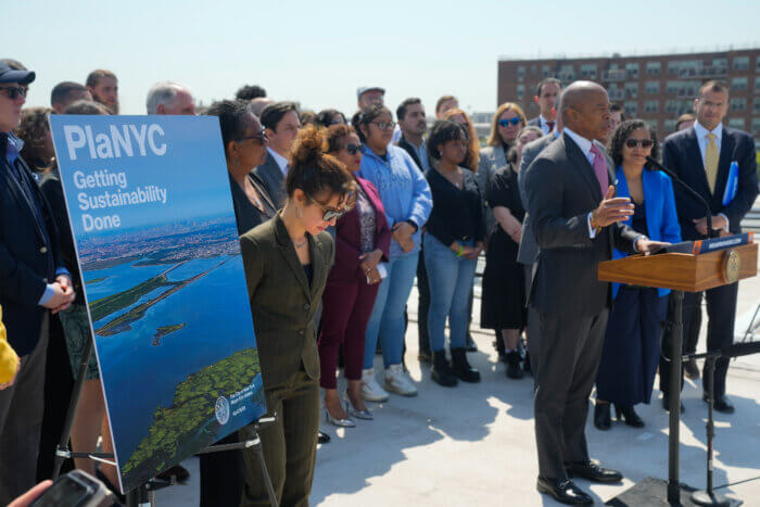 press conference with Mayor Adams at a podium