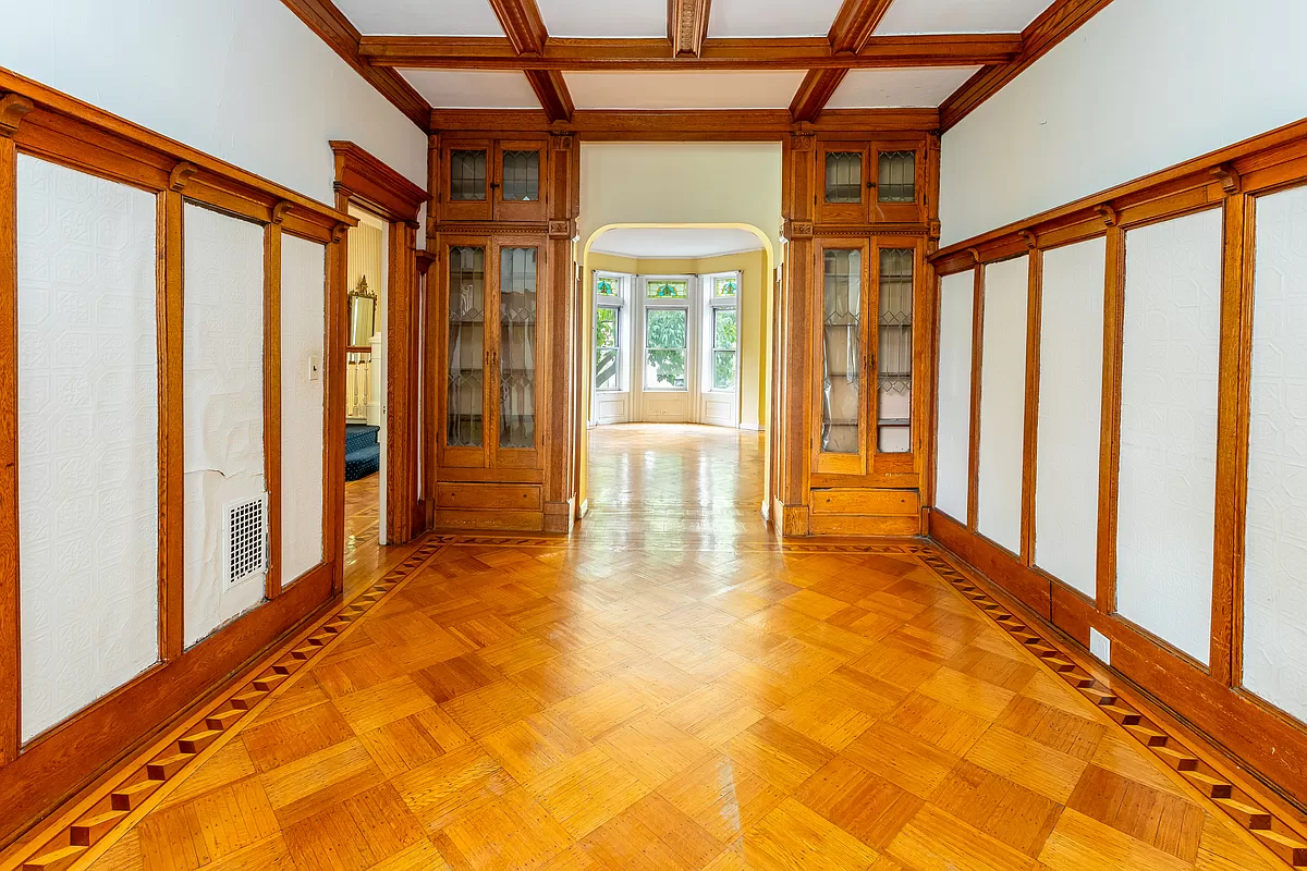 bay ridge - dining room with built-ins, coffered ceiling and plate shelf