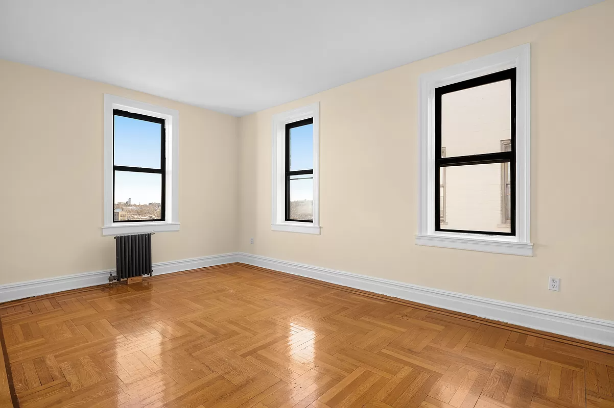 living room with two exposures and wood floor