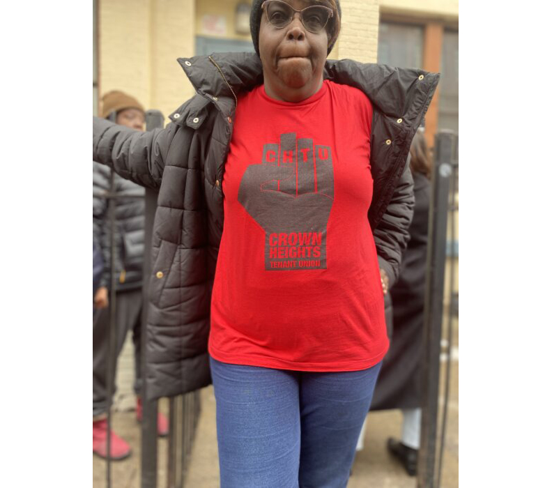 a tenant wears a tshirt for the crown heights tenant union