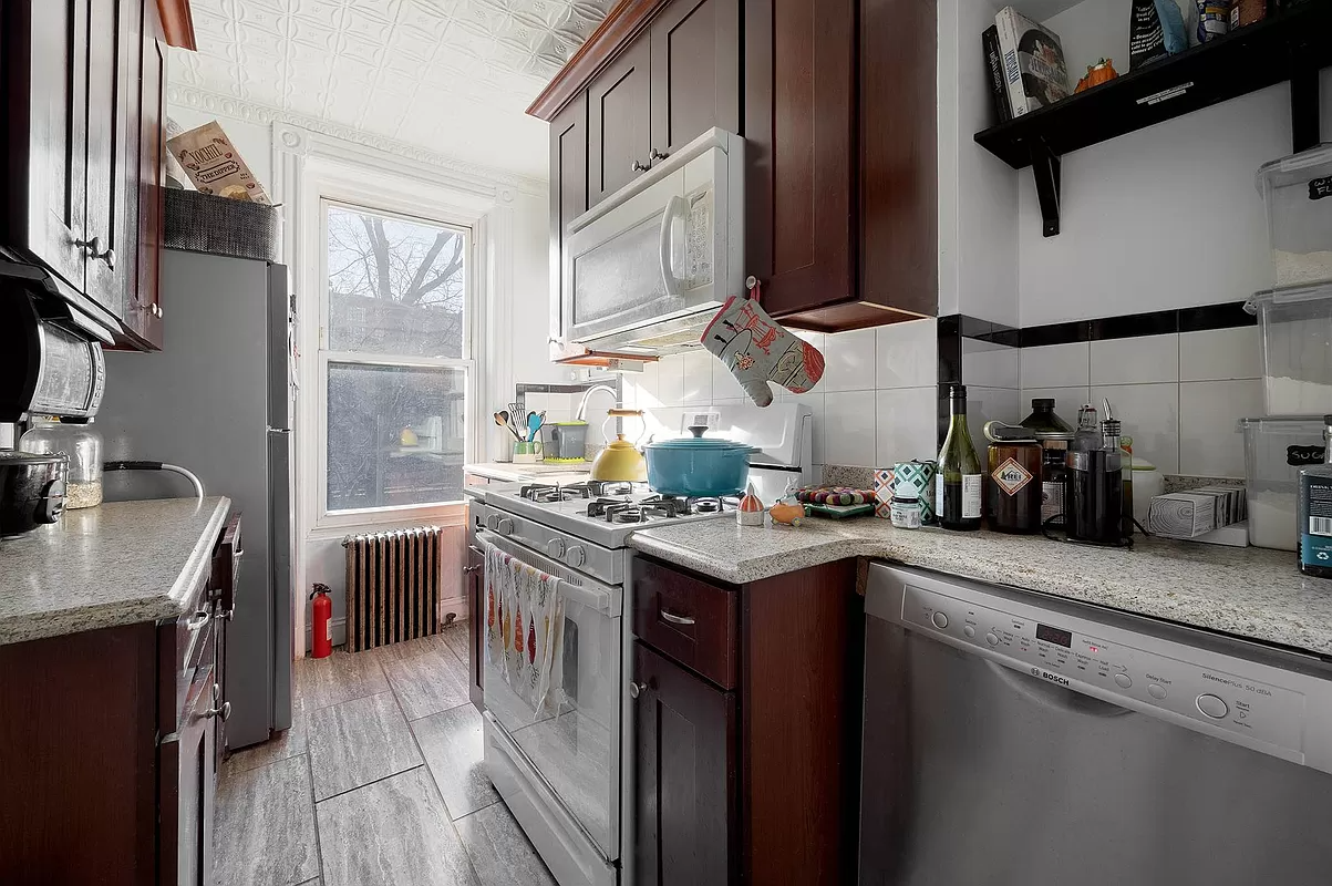 kitchen with wood cabinets and a dishwasher