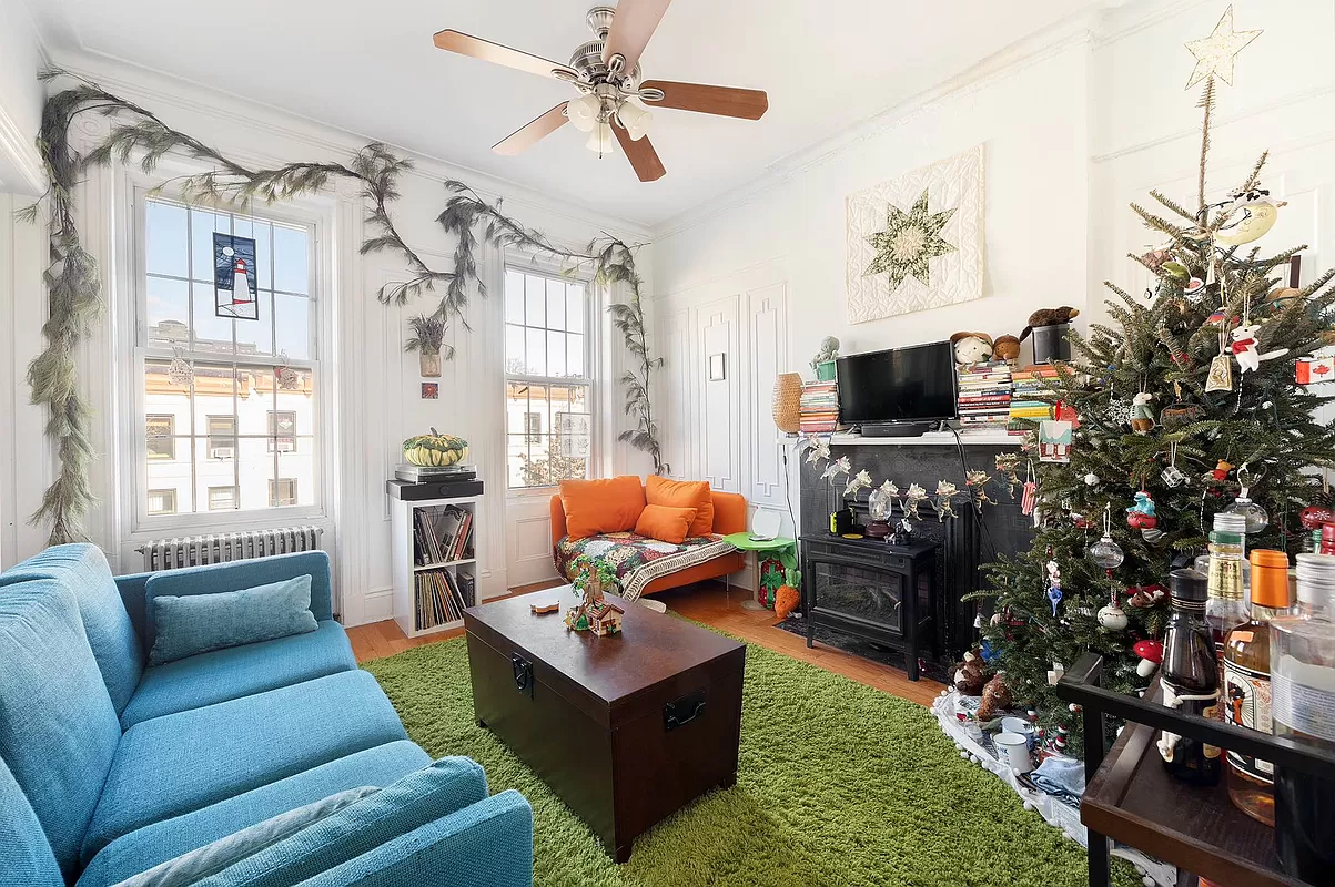 crown heights - living room with wood floor and wall moldings