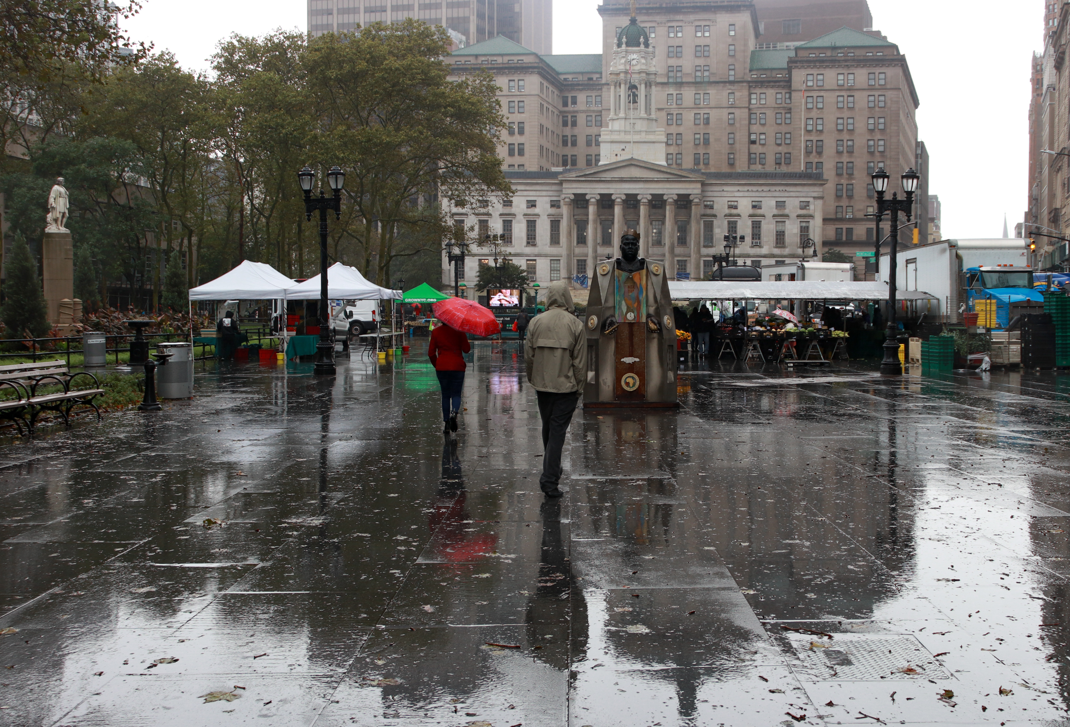 brooklyn rain - pedestrians walking in the rain near borough hall