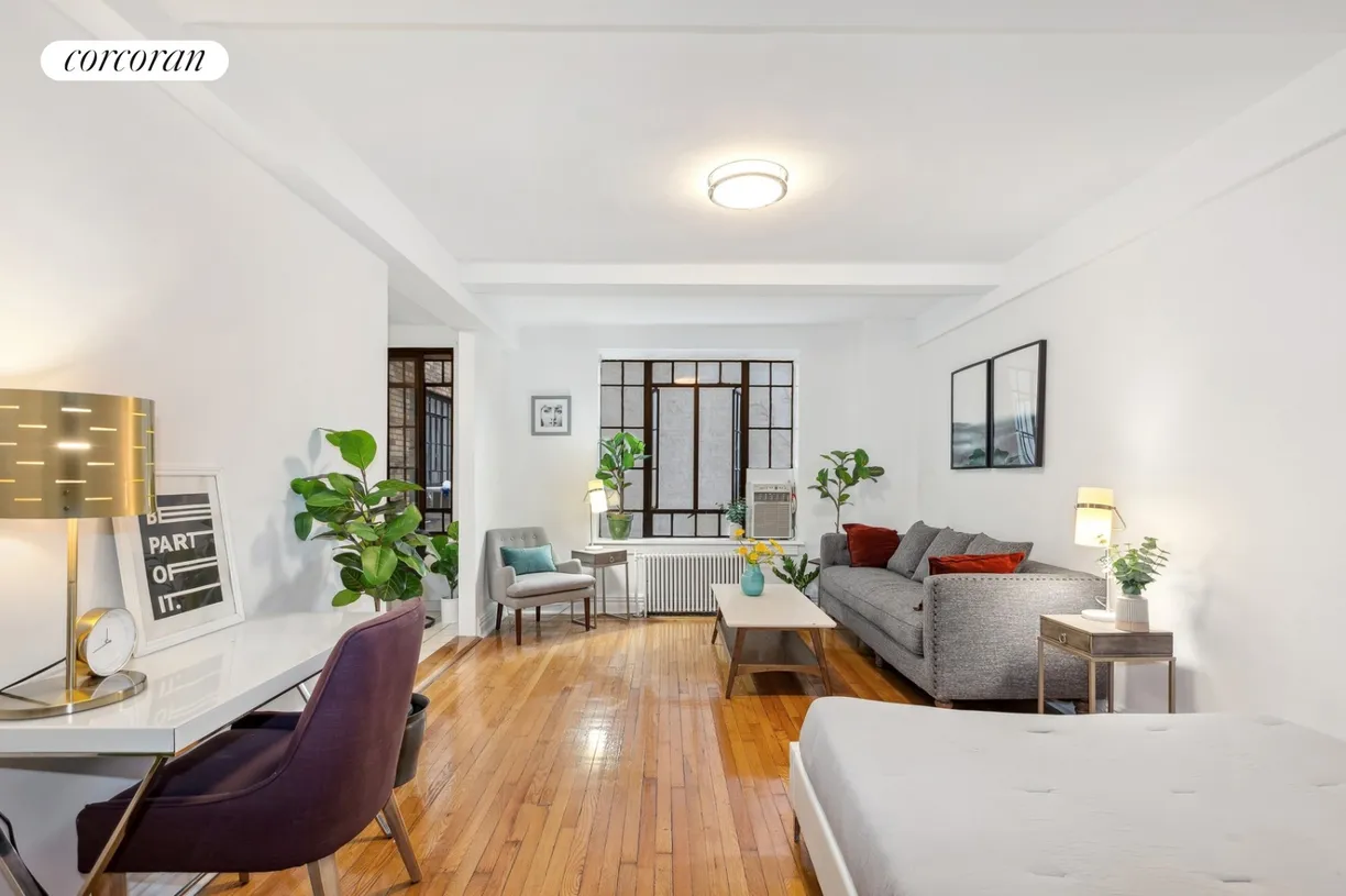 fort greene - living area with wood floor and white walls