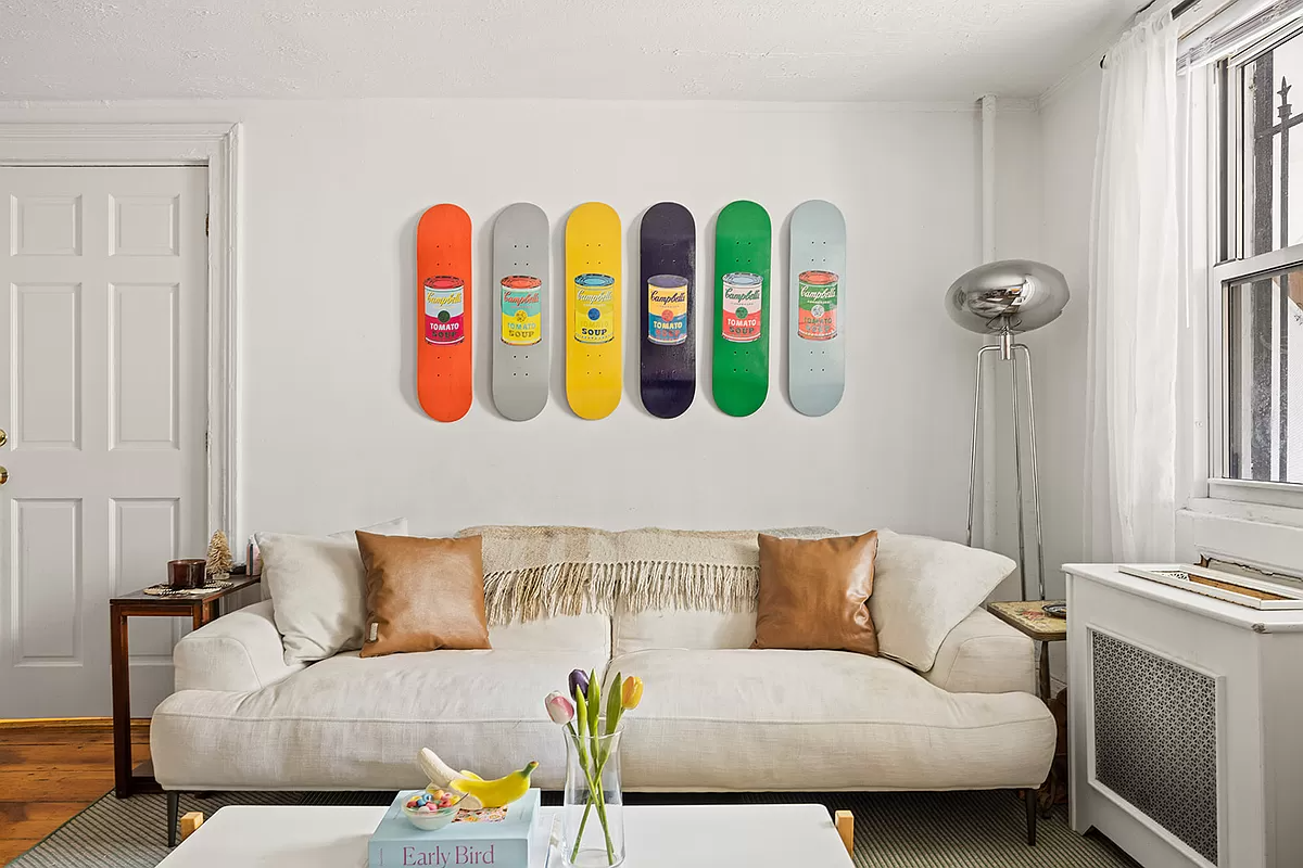 living room with white walls and a wood floor