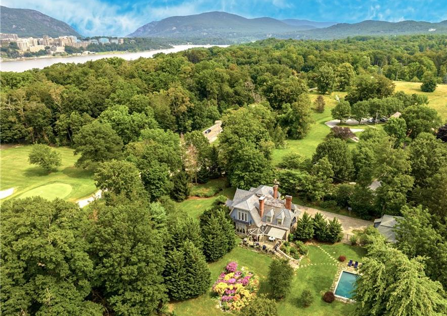 garrison - aerial view of the house showing the hudson river in the distance