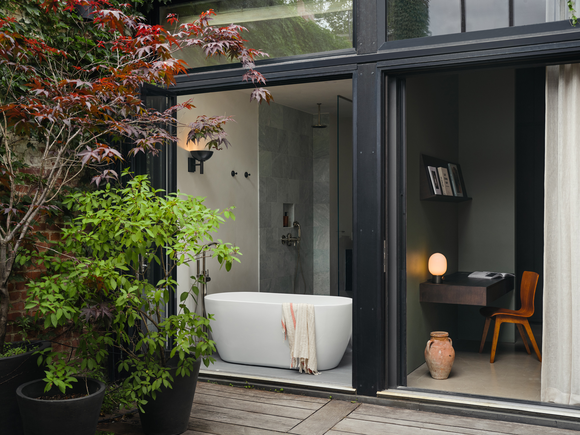 GLASS WALL WITH VIEW TO TUB