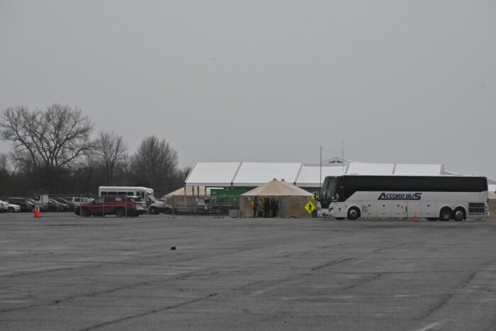 parking lot with buildings in the distance