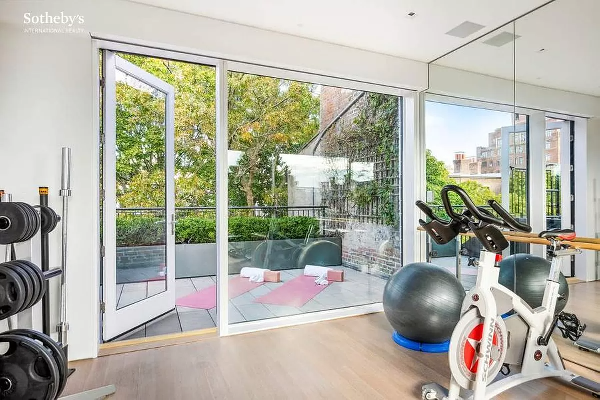 gym with glass door to terrace