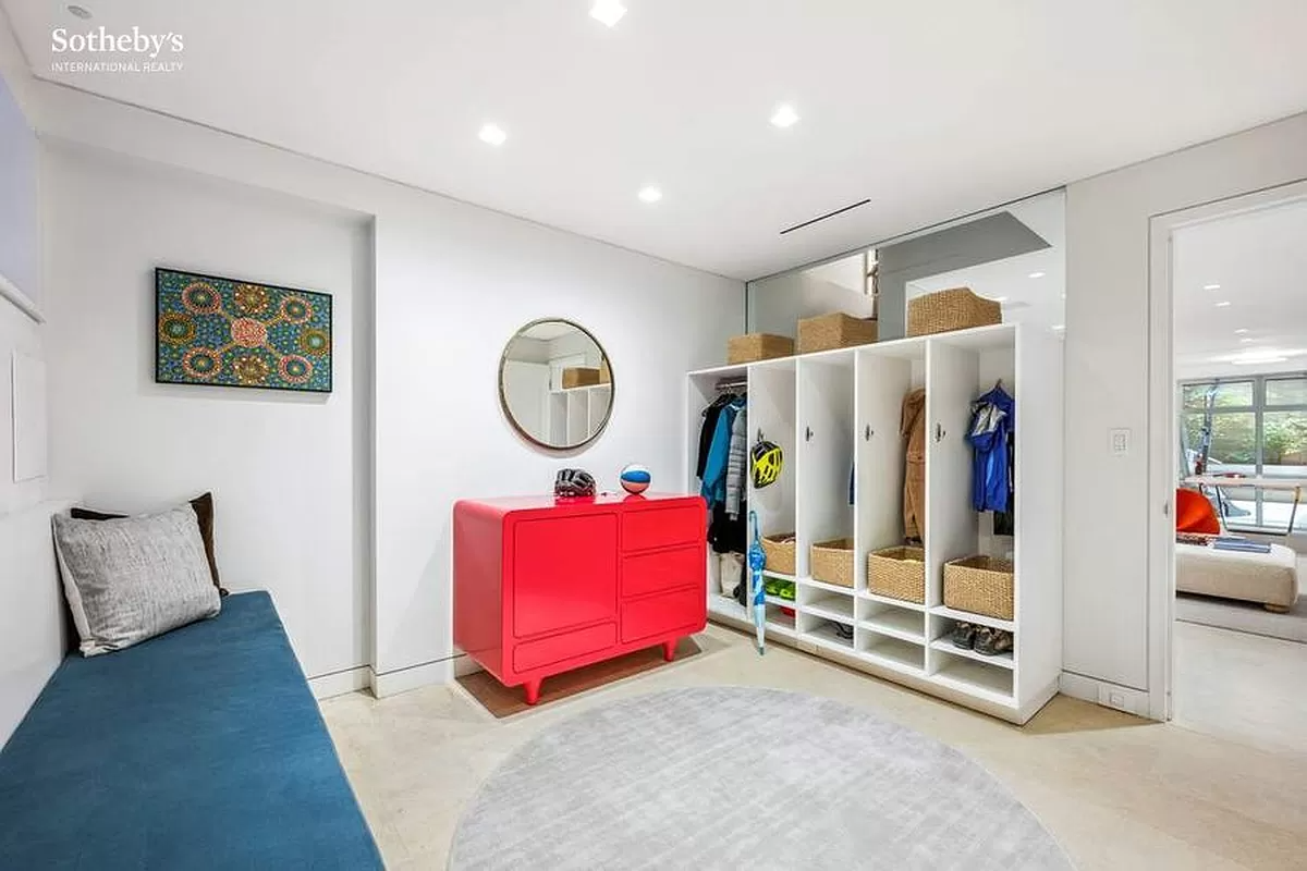 mudroom with a bench and recessed lighting