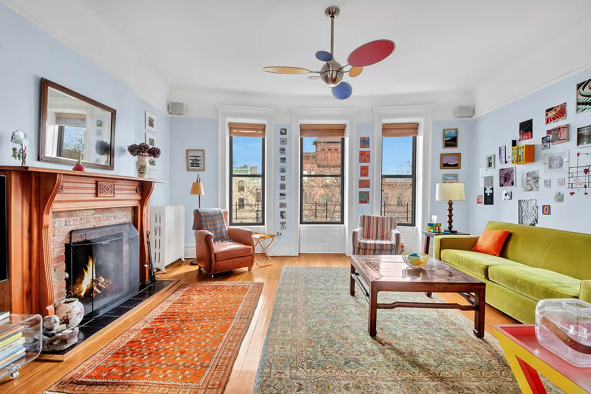 park slope - living room with wood mantel, wood floor and picture rails