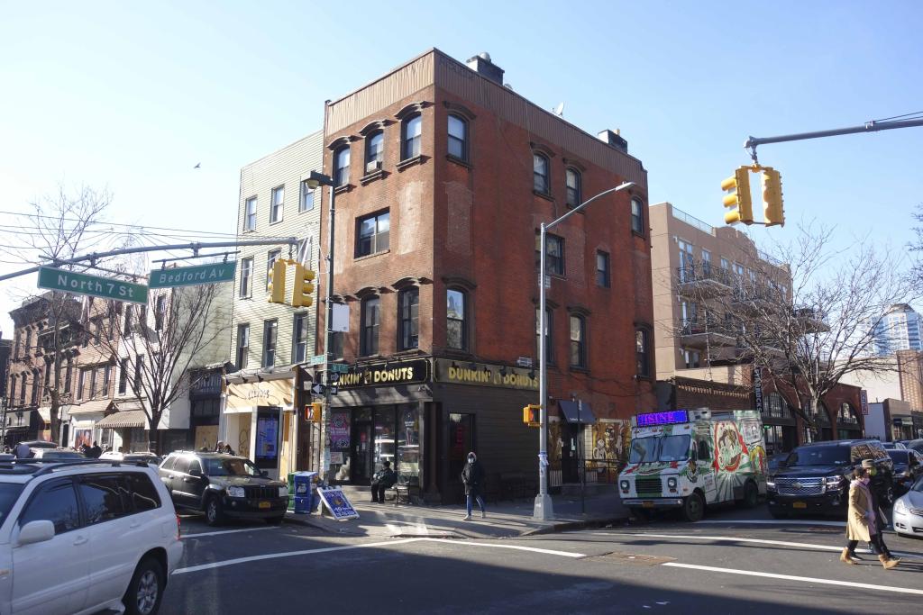 the corner before demolition with buildings under five stories