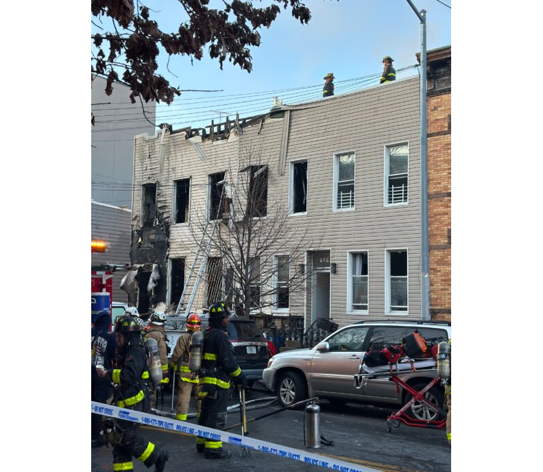 firefighters on the roof of the houses