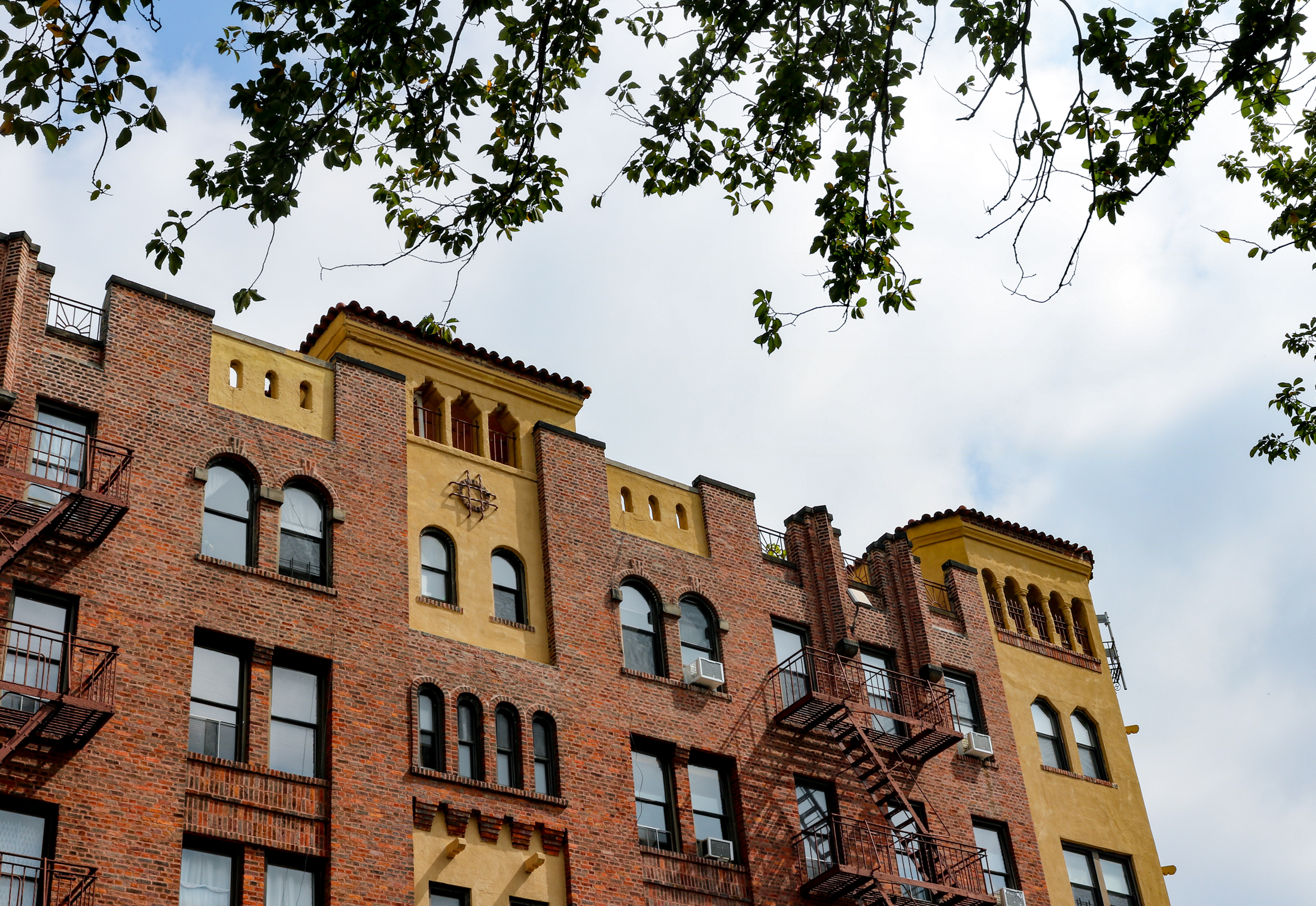 apartment building - roofline of brick apartment building in prospect lefferts gardens