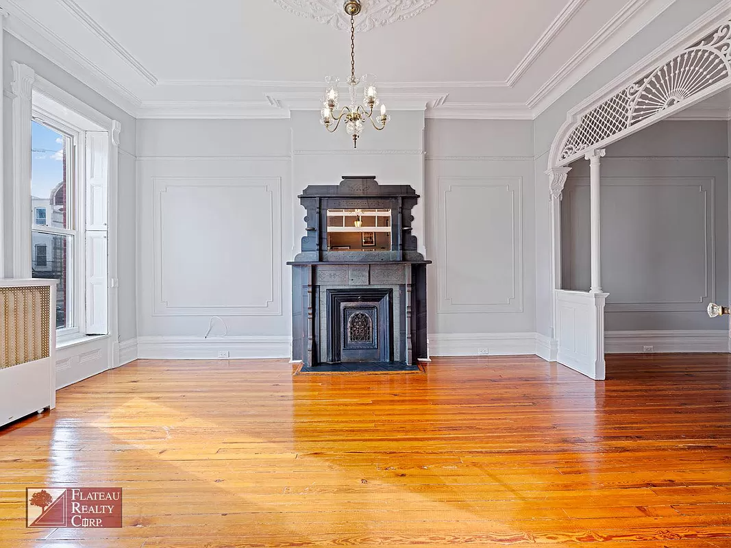 living room with fretwork and mantel