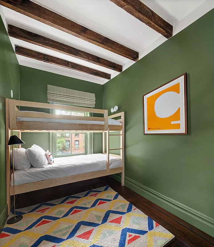 bedroom with exposed beams on the ceiling