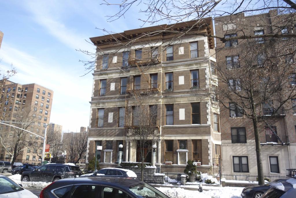 brick building with a deep bracketed cornice