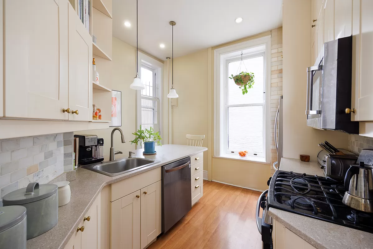 kitchen with white cabinets