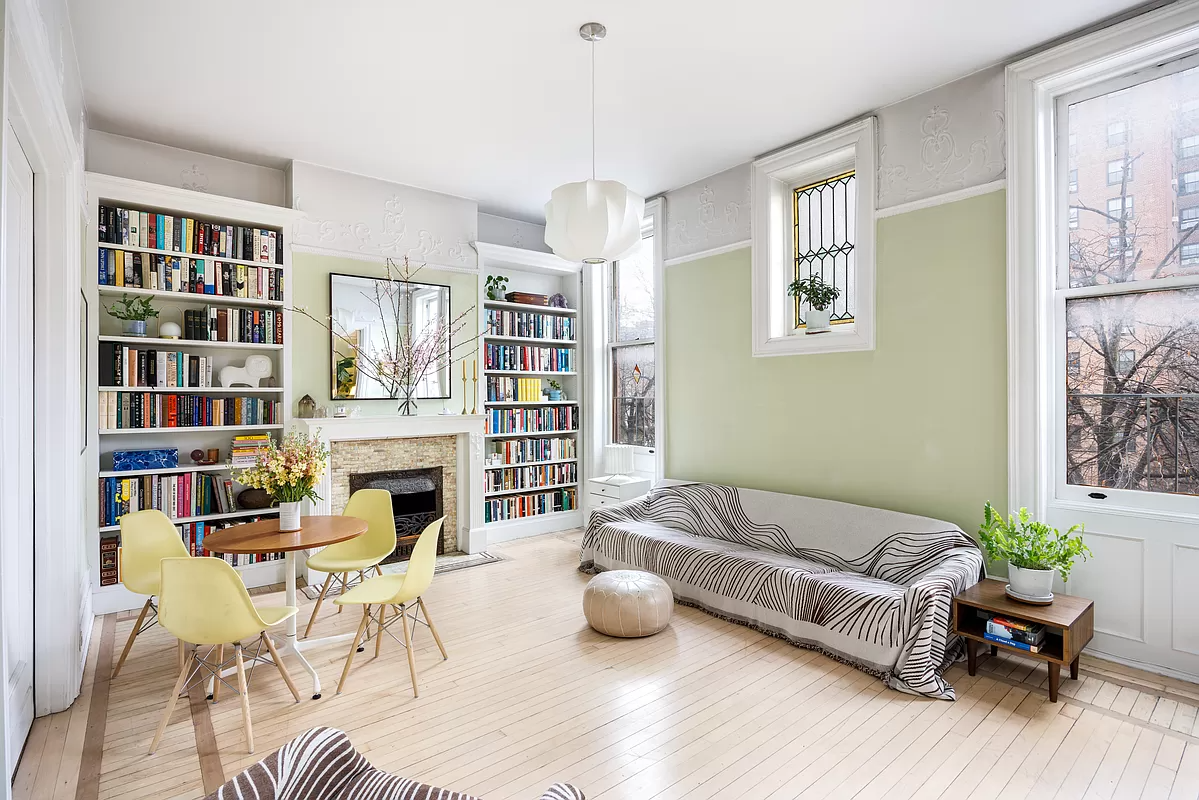 clinton hill - living room with plaster details and stained glass