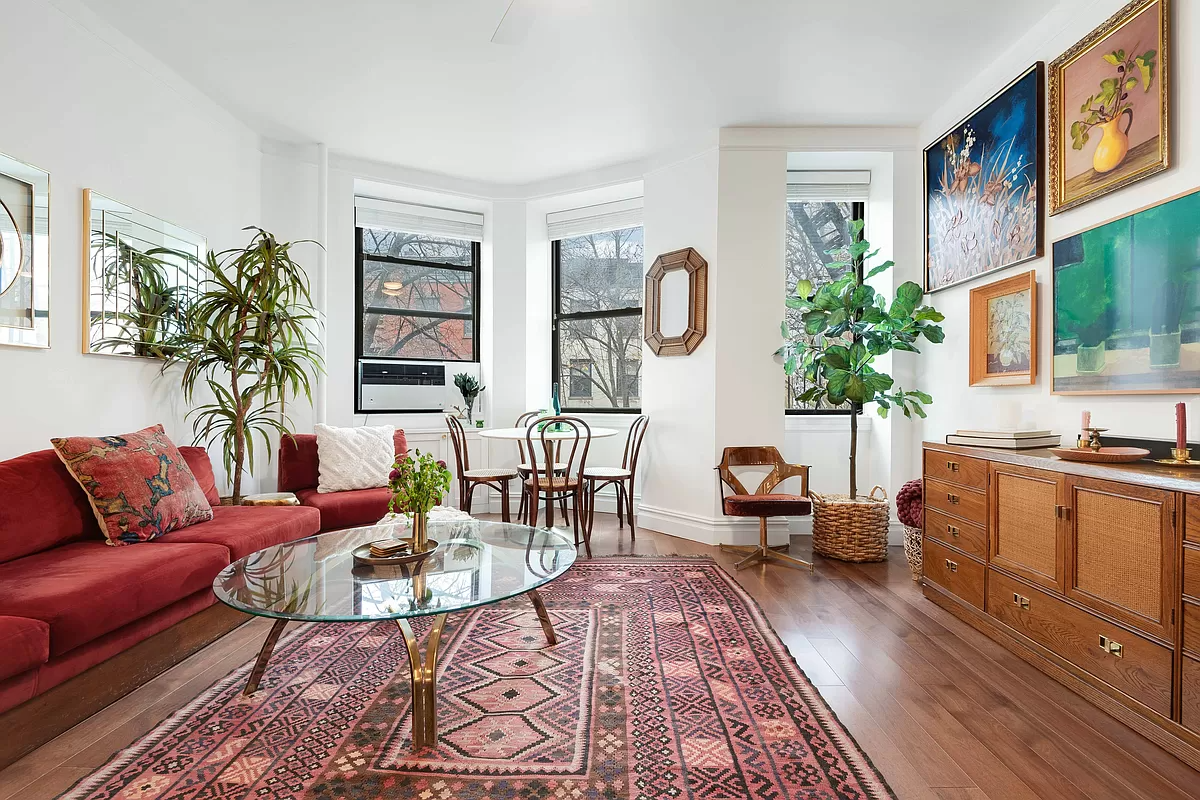 cobble hill - living room with white walls three windows