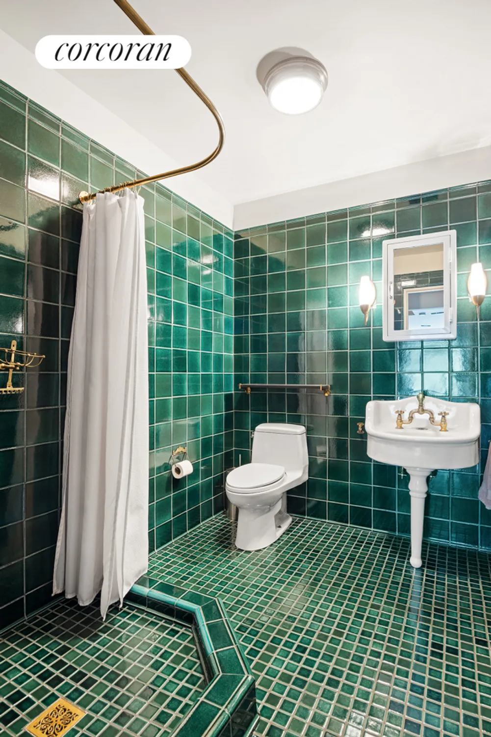 bathroom with green floor and wall tile
